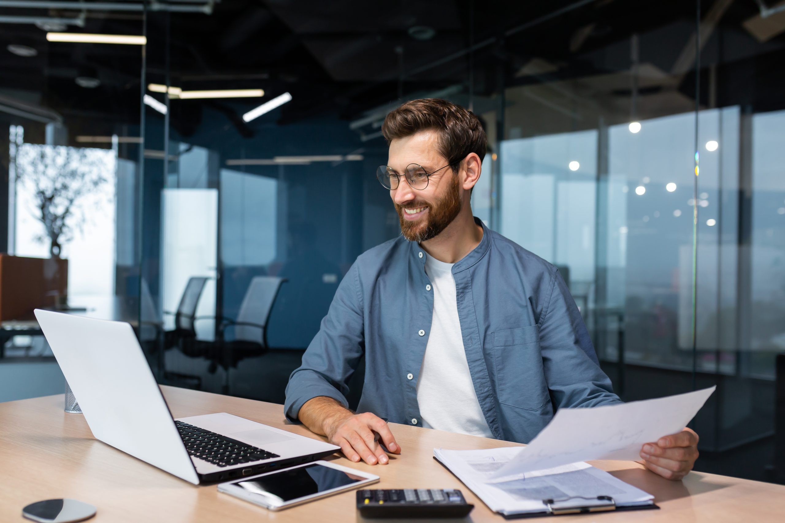 Businessman In Shirt Doing Paperwork