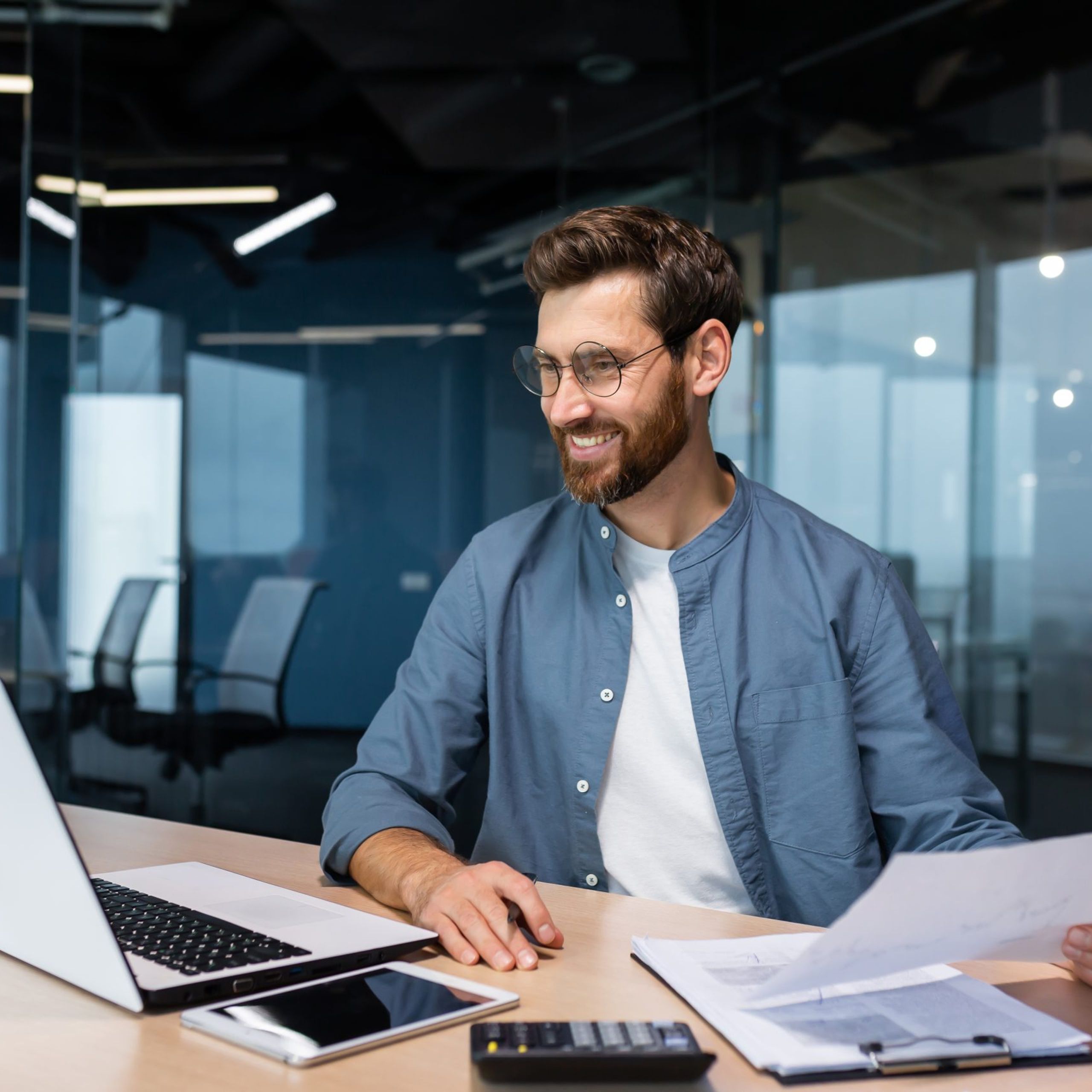 Businessman In Shirt Doing Paperwork