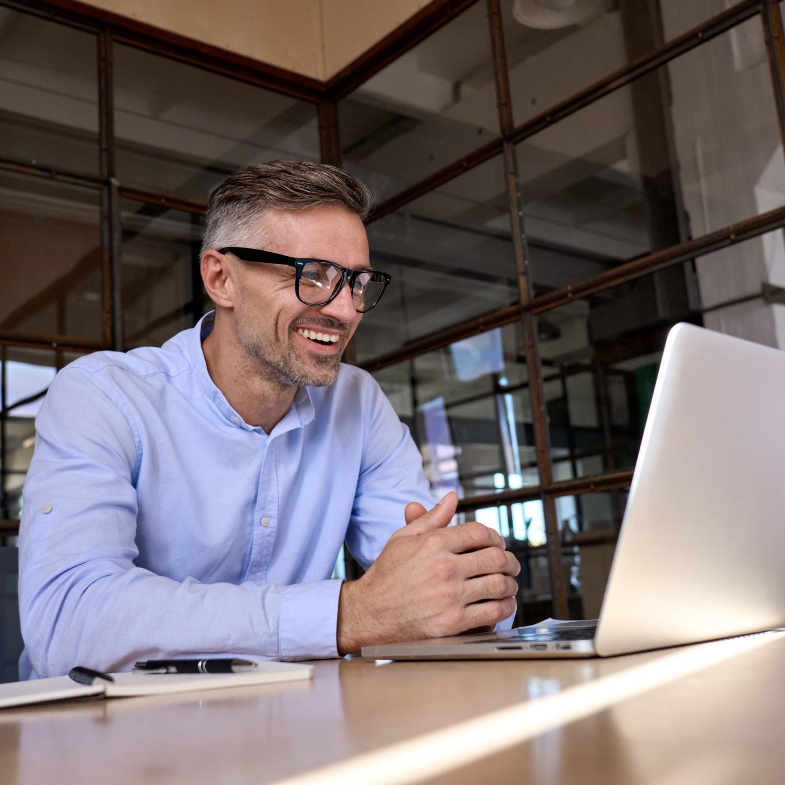 Business Man Looking At Laptop