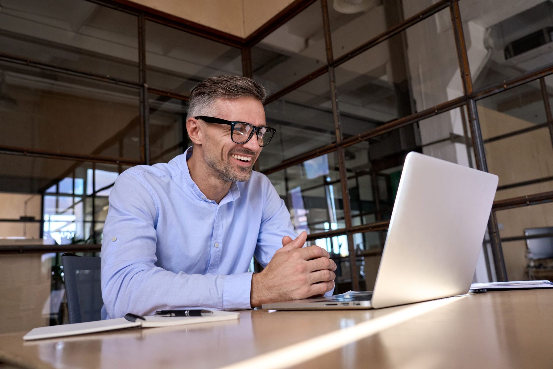 Business Man Looking At Laptop